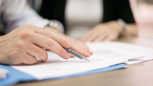 person doing paperwork